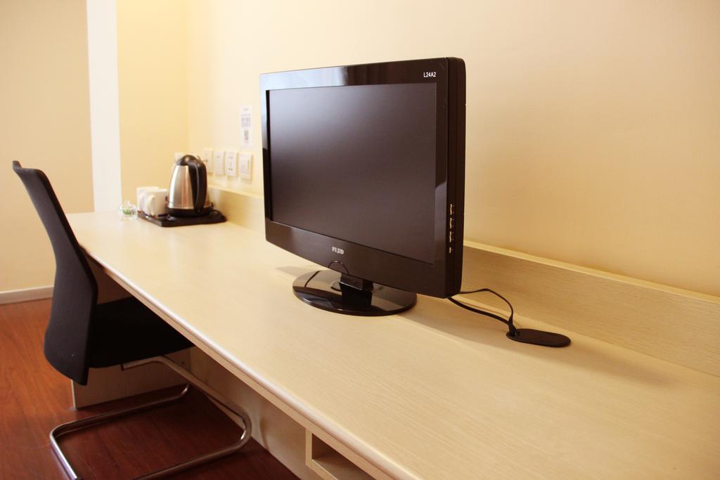 Hanting Express Jinzhou Luoyang Road Central Avenue Room photo